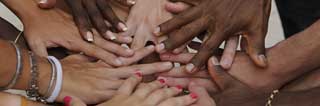 Many hands coming together in unity