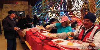 Food being served to those in need at a Catholic Church
