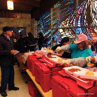 Food being served to those in need at a Catholic Church