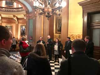 MCC Vice President for Public Policy Tom Hickson guides nonpublic school principals to Senate session and helps them pull lawmakers off the Senate floor for individual legislative meetings.