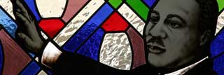 A stained glass window featuring Martin Luther King Jr.