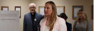 Rebecca Mastee, with the Michigan Catholic Conference, delivers comments at the Michigan Values Life Press Conference
