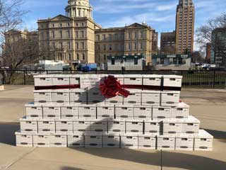 Boxes containing the 379,418 total signatures submitted to the Board of State Canvassers in support of ending the second trimester dismemberment abortion procedure