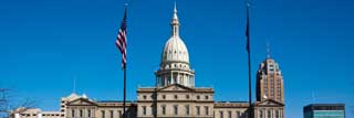 The exterior of the State Capitol Building in Lansing, Michigan