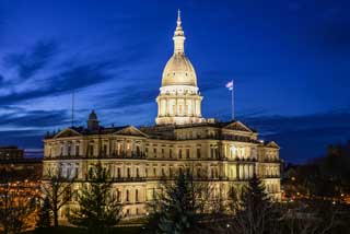 The Michigan State Capitol building at dusk