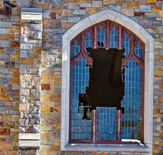 A broken church window.