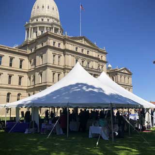 Attendees at the Empowering Women, Strengthening Communities event held on the Capitol lawn