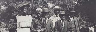 Six Black Americans participating in an Emancipation Day (Juneteenth) celebration in 1900 in Texas.
