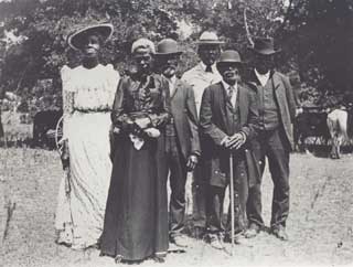 Six Black Americans participating in an Emancipation Day (Juneteenth) celebration in 1900 in Texas.