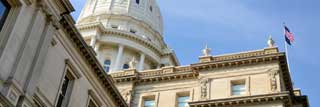 Closeup of the Michigan State Capitol dome as seen from outside of the building