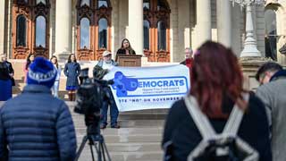A member of the Progressive Anti-Abortion Uprising speaks at the Michigan State Capitol against Proposal 3 during a press conference on Thursday, October 13, 2022.