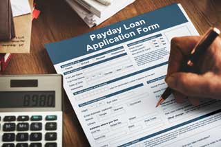 A payday loan application being filled out.