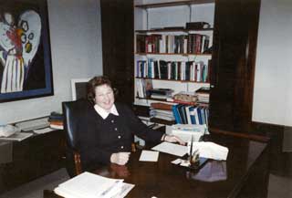 Sister Monica Kostielney, R.S.M. working with joy at the former MCC office building on North Capitol Avenue in Lansing.