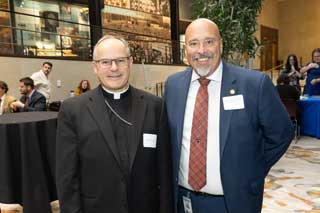 Bishop Edward Lohse of the Diocese of Kalamazoo, with Rep. Steve Frisbie (R-Battle Creek).